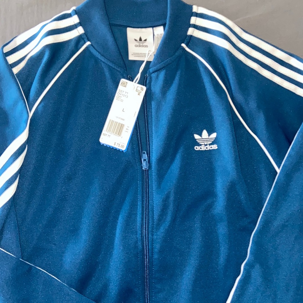 Brand new adidas track suit jacket never worn
